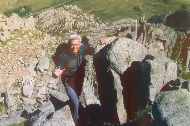 Milorad climbing on some rocks